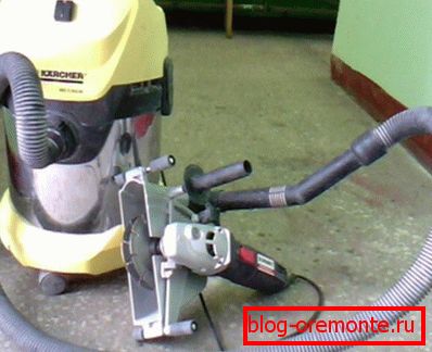 La foto muestra una herramienta eléctrica en conjunto con una aspiradora industrial. La foto muestra una herramienta eléctrica en conjunto con una aspiradora industrial.