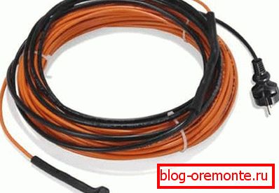 En la foto - Cable para calefacción de hormigón. En la foto - Cable para calefacción de hormigón.